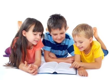 Kids reading book together