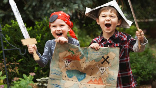 West New York, New Jersey, USA --- Caucasian boys dressed as pirates --- Image by © KidStock/Blend Images/Corbis